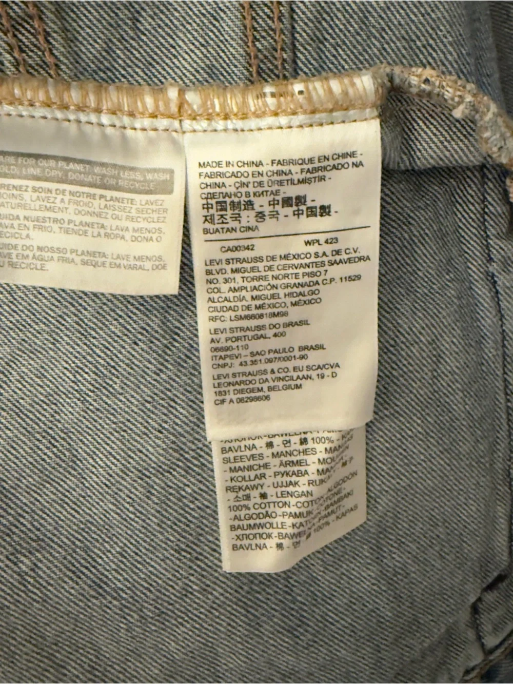 Levi's Blue Denim Jacket with Light Gray Hoodie Sleeves